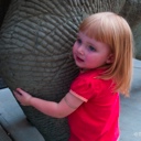 Giving the dinosaur a goodby hug and kiss